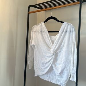 large white express top with wrap cutout in back